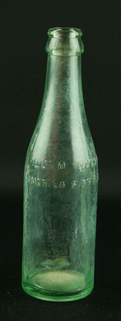 8 1/4" 'Pluto Water' Bottle: Pluto Water, America's Physic, with Devil and 'Pluto' on base. This mineral water was bottled at French Lick Springs, Indiana and sold as a laxative. Found by Art Heaton in and around Batavia, Ohio. 1