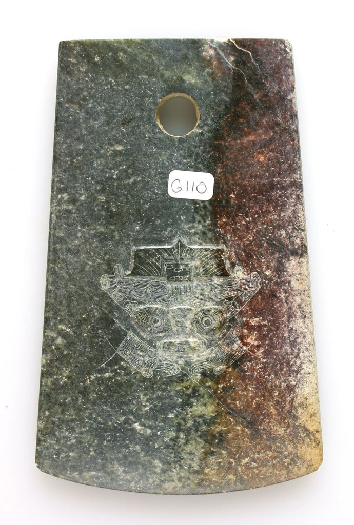 6 3/8" Chinese Engraved Luangshu Axe: Super attractive purple/wine colored stone example with engraved dragon face on one side. Exact age unknown.