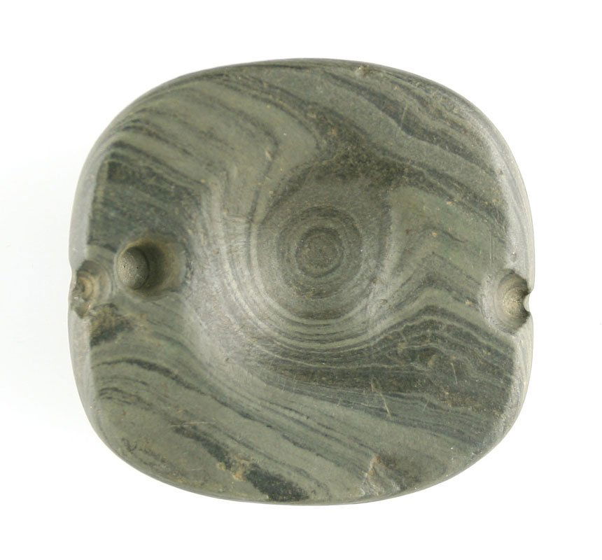 1 7/8" Banded Slate Cupped Boatstone: Rare form. Pretty green banded slate. Drilled on both ends and deeply cupped in the middle of the back side. Found in Ontario, Canada. Ex- Kirk Whaley and Ernest Schug Collections.