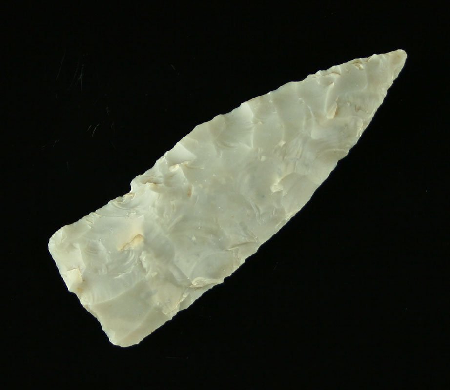 2 1/2" Texas Stemmed Knife: High grade semi-translucent Edwards Plateau Chert. Appears to have been a stemmed knife that maintained it length but lost its sides in the resharpening process. Hard to type. Nicely flaked. Almost 'S