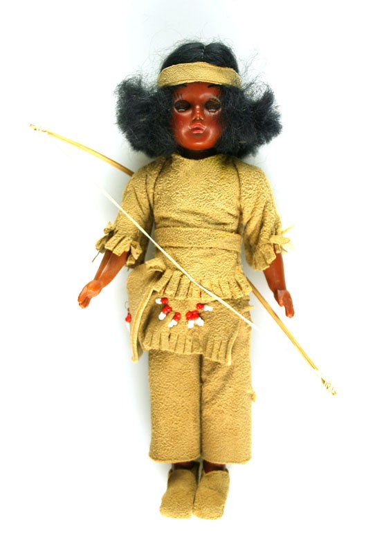 7 5/8" Vintage Indian Warrior Girl Doll with Bow: Nice doll dating to the 1960's 1970's. Eyes open and shut.