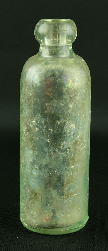 7" Soda/Milk Bottle: Blobl top bottle marked A.C. Gilligan, Cincinnati. Raised lettering and a raised eagle on the outside of the bottle.