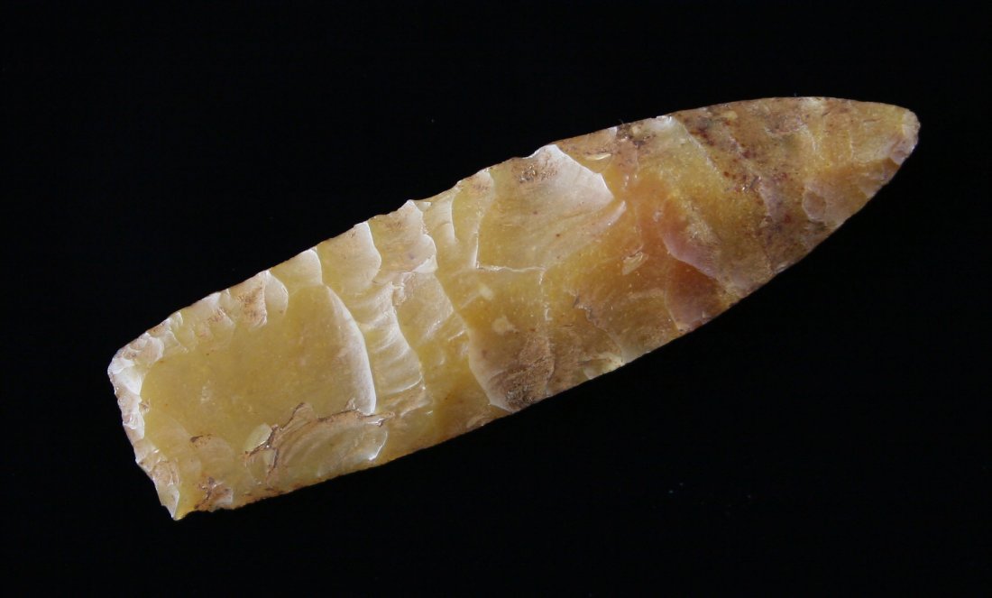 2 1/16" Paleo Dart: Western Paleo type from Eastern Colorado. Yellow agate!. Might be Cody Complex. Some wind wear.