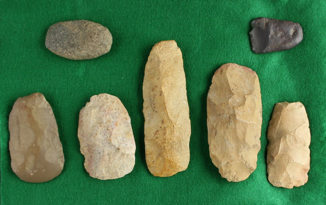 7 Celts: Nice group of flint, stone, and hematite celts from the Art Heaton Collection. Some with great polish.