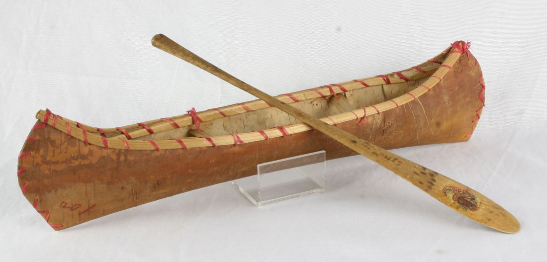 14" Birchbark Toy Canoe: Nice toy example from the 1960's-1970's with wooden paddle. Highly decorative and in great condition!