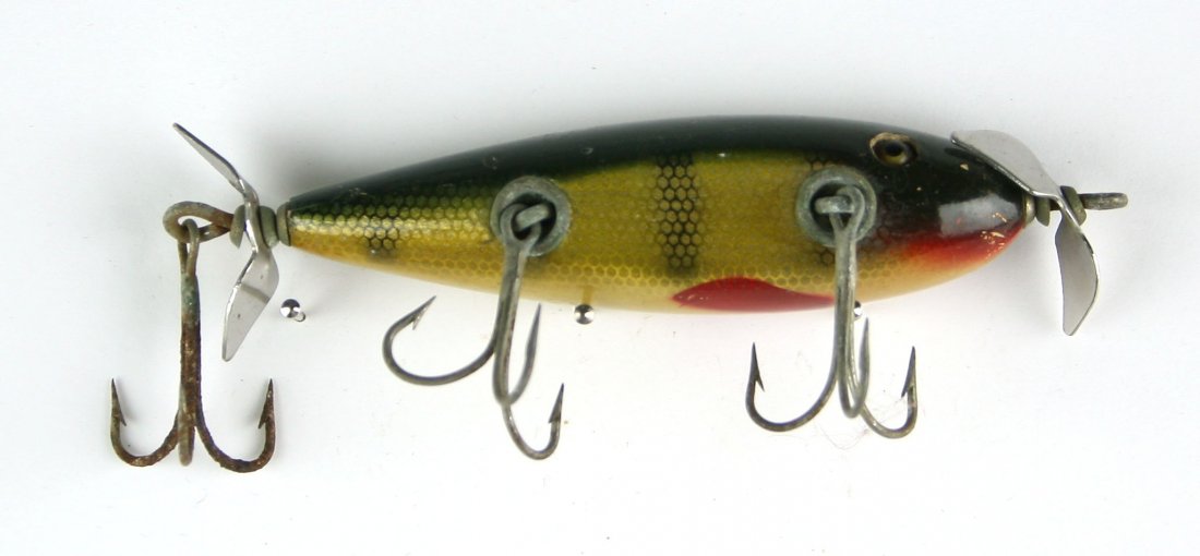 Vintage Wounded fish Lure: Hand carved wooded lure with hand painted pattern with glass inset eyes.