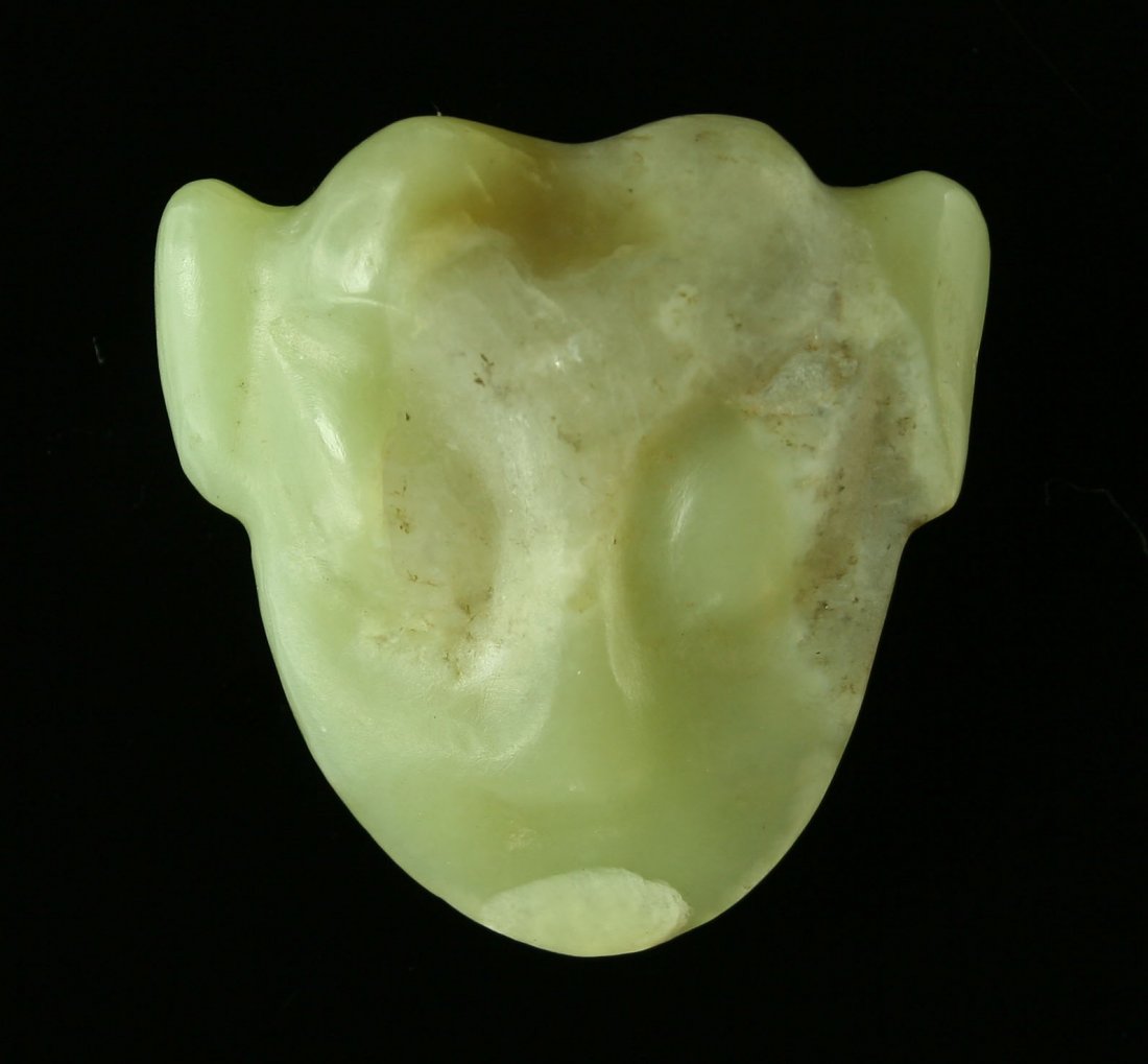 Early 'Alien Style' Chinese Jade Effigy Pendant: Highly polished Jade with graet translucency. Bi-conicalled double drilled in the correct ancient manner on the reverse for suspension. Appears to be ancient but exact age unknown. Old Pennsylvania Co