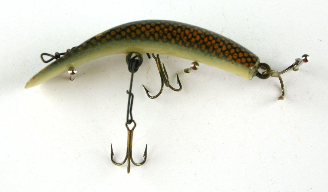 Vintage wooden Flatfish 'SPU' Lure: Triple Treble lure in cream, orange, and black.