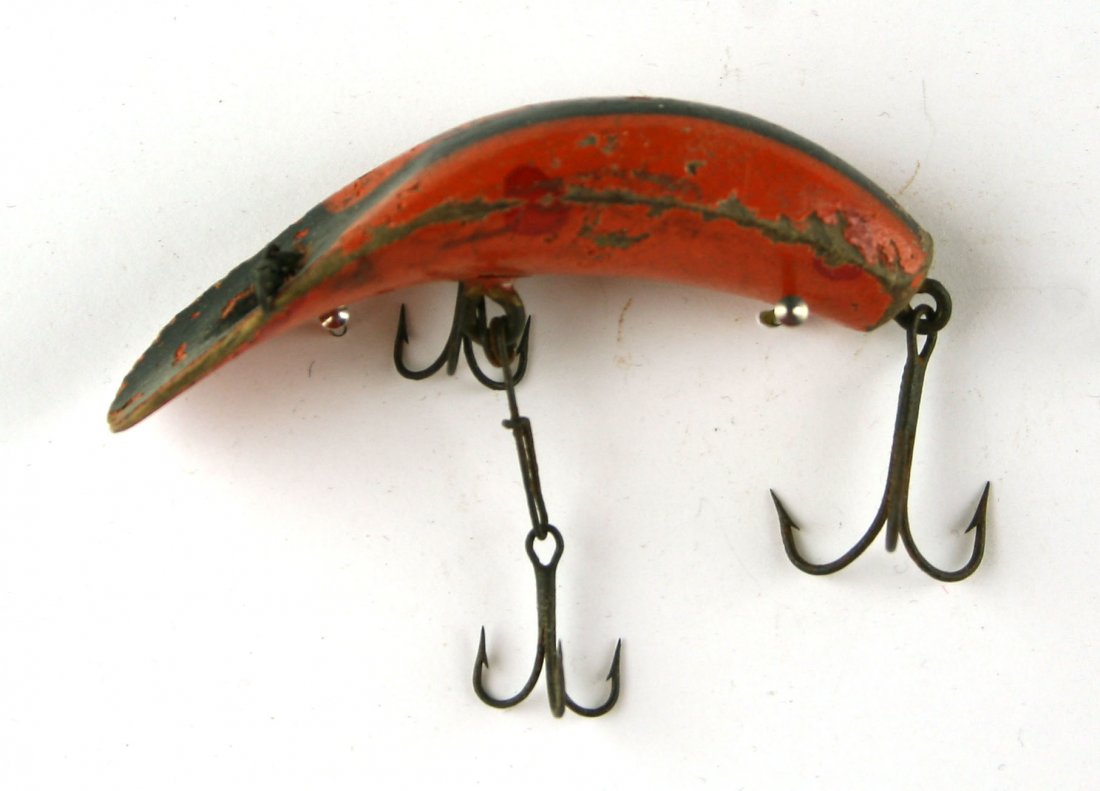 2 3/4" Vintage Flatfish Wooden Lure: Early version of this popular lure in an unsual colro pattern. Orange with black stripe and red dots.