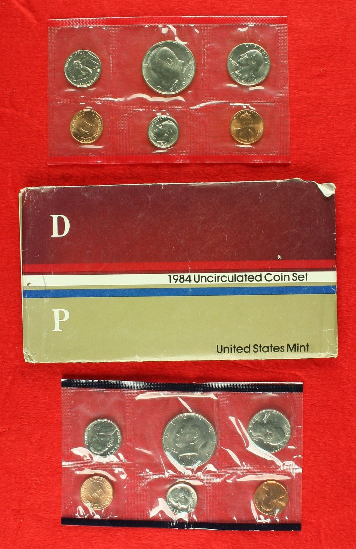 1984 Uncirculated Coin set.: Two complete sets of US coins, one from the Denver Mint, one from the Philadelphia mint, still in sealed plastics with original envelope and paperwork. Great for collectors