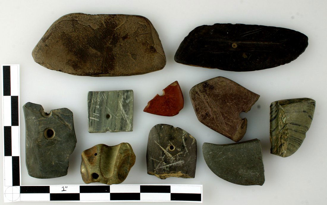 Assortment of Slate Artifacts: Nice lot of fragmentary Pendants/Gorgets/Bannerstone, includes an awl/needle sharpening stone. Ex - Bratcher Collection.