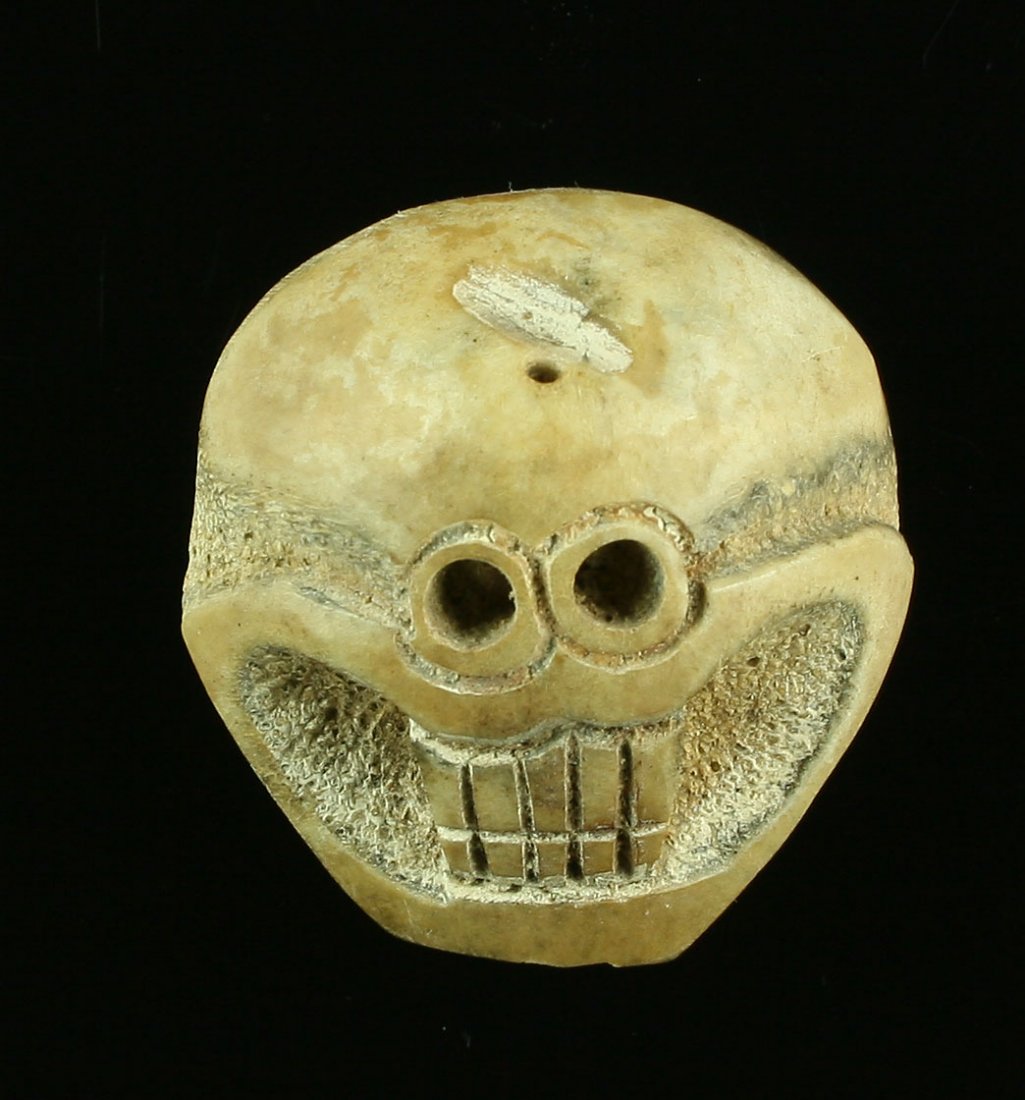 2" Bone Skull Effigy Bead: Unusual bead in the form of a stylized skull. Weird and neat.