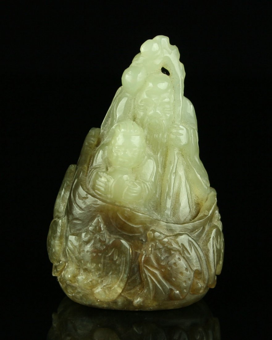 Superb Chinese Jade Carving of Elder Shou Xing with: Shou Xing - the Chinese God of Longevity. Intricately carved beautifully translucent light to slightly darker green Celadon Jade with a super fine old smooth polish. Probably late Qing Dynasty. From a
