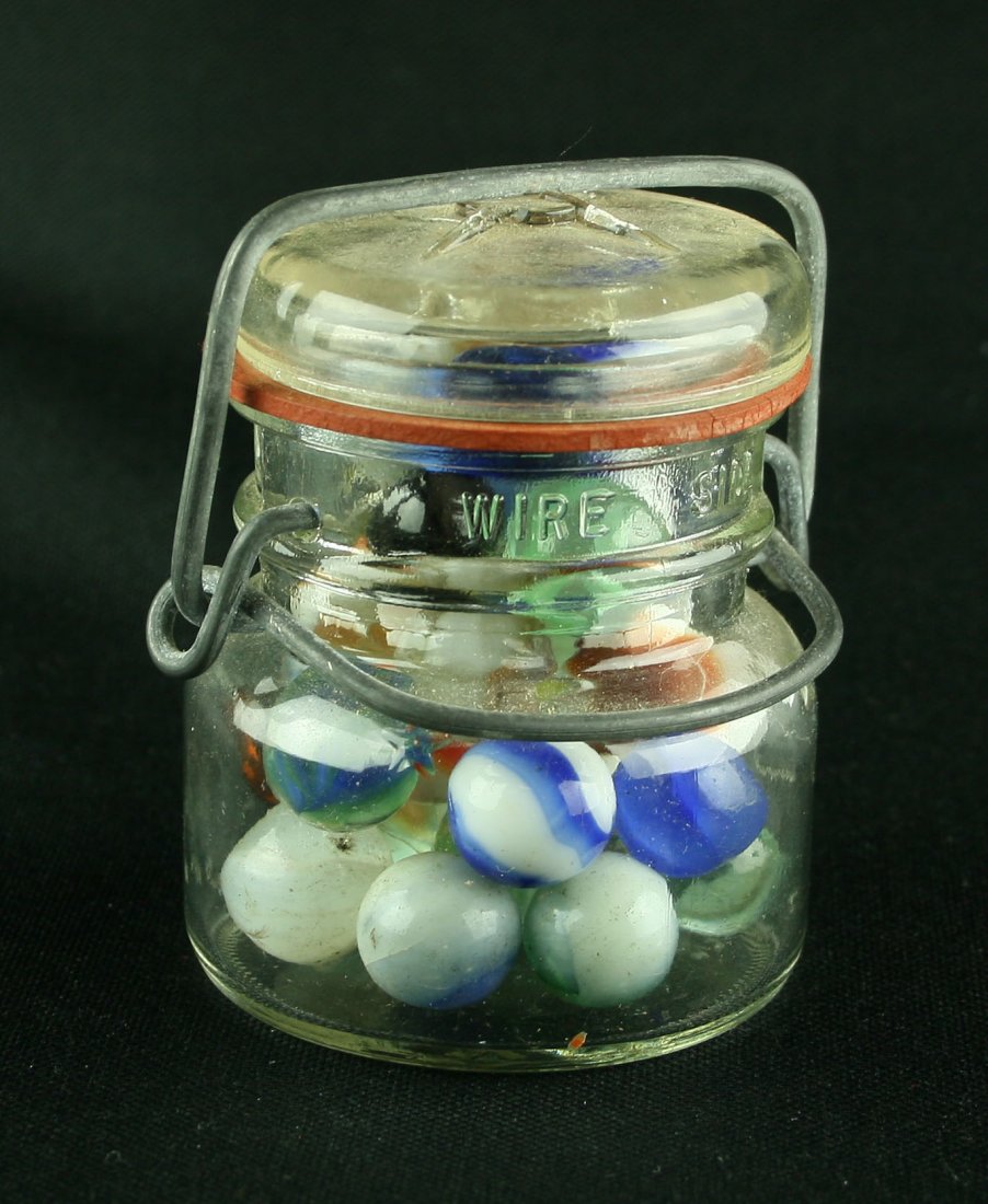 Marbles in a small Flip-Top Mason Jar: Nice decroative lot of vintage marbles in an old jar.