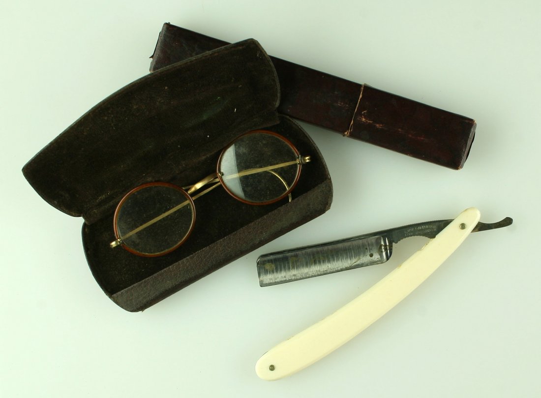 CV Heljestrand Straight Razor: 33 4/8 No.31 Razor with bone or synthetic scales. Original box included. Lot also includes antique Spectacles.