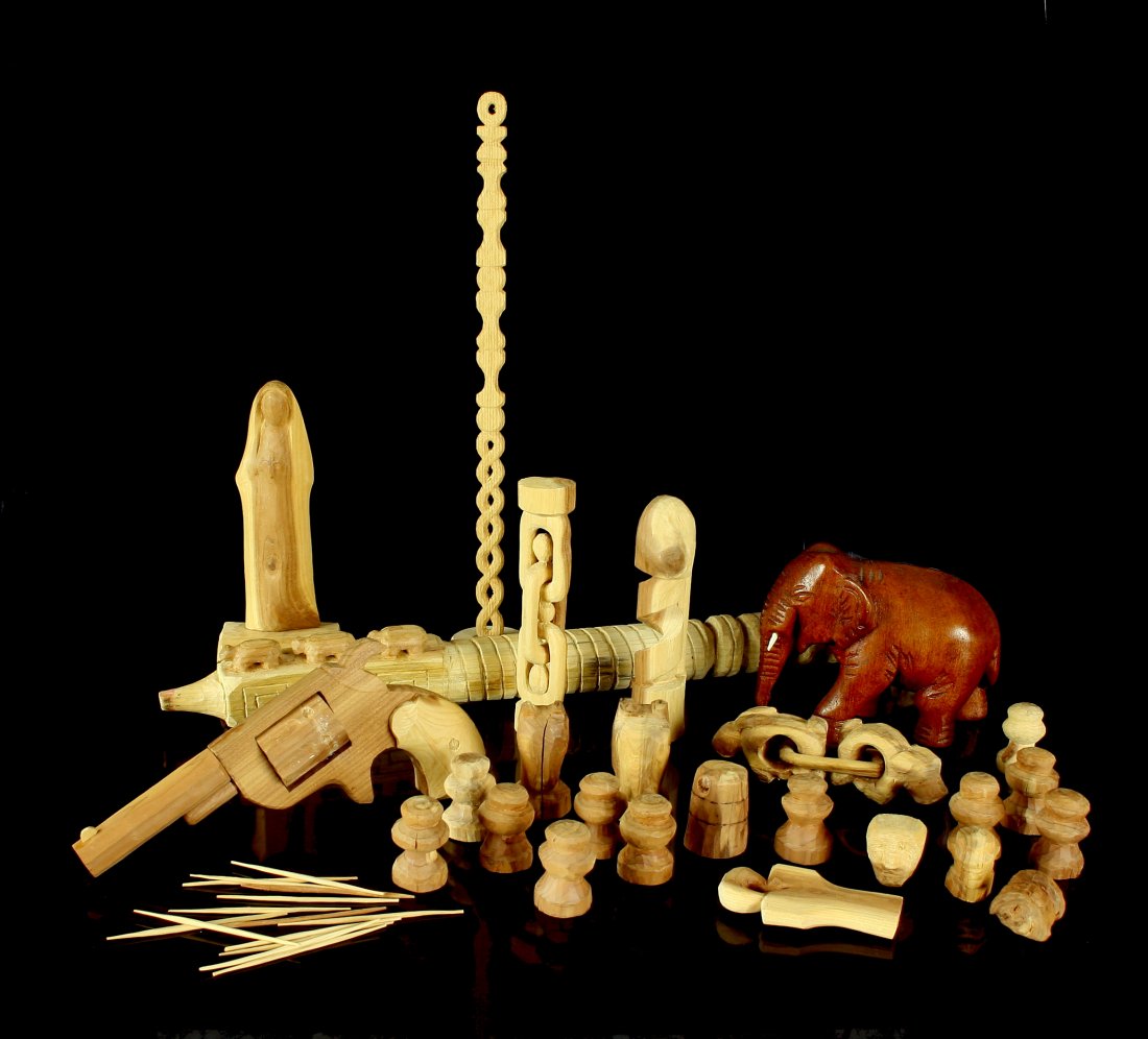Hand Carved Folk Art: Wooden Chains, Chess Set, Pipe Stem, Virgin Mary/Nun, Elephant, Pistol, Staff. Interesting grouping all hand-carved by Dale Bratcher.