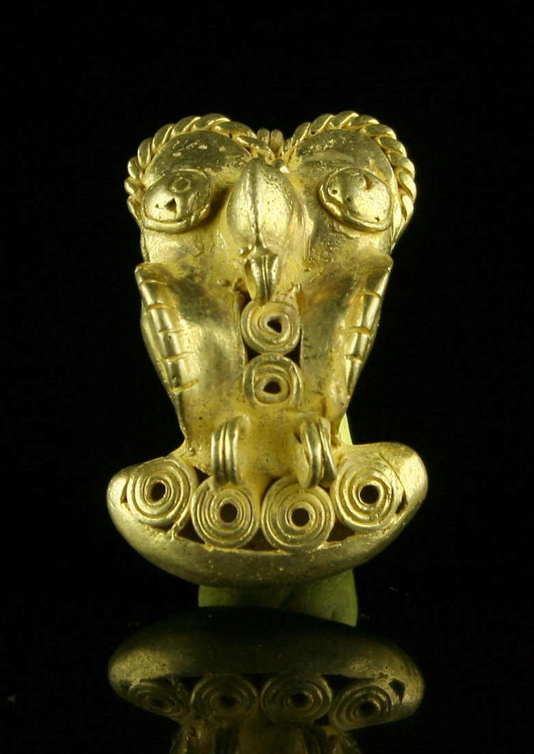 1 5/8" Tairona Gold Effigy Pendant: Colombia. Nice example in the form of an Owl with more intricate detail work. Tumbaga gold of unknown karat weighing 16 Grams. Circa 1000-1600 AD