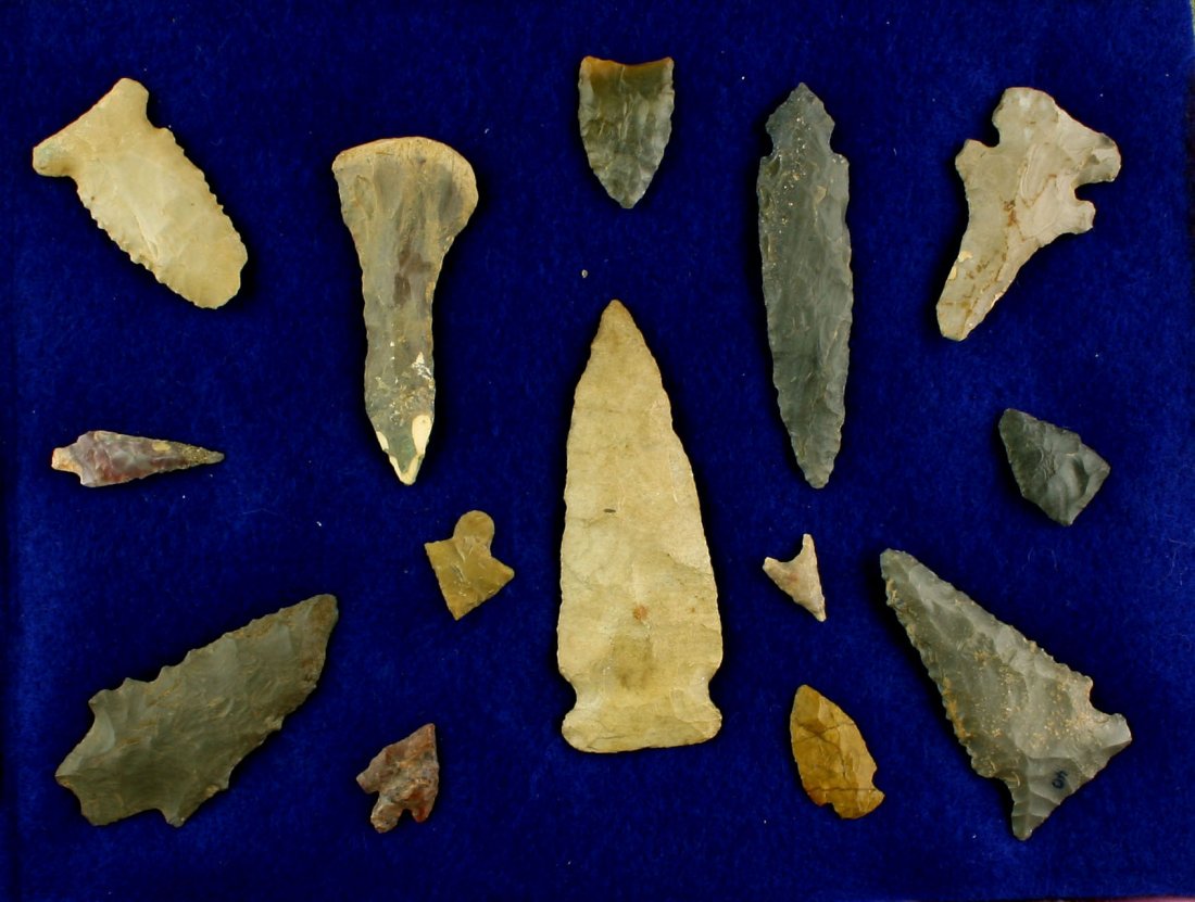 Small Collection of 14 Mostly Midwest Artifacts: All collected by Dale Bratcher of Louisville, Kentucky. Biggest is a 3 1/8" Burlington sidenotch. All look correct except drill has a restored tip. Sold as 'Decorative Only'. Really nice hangable plas