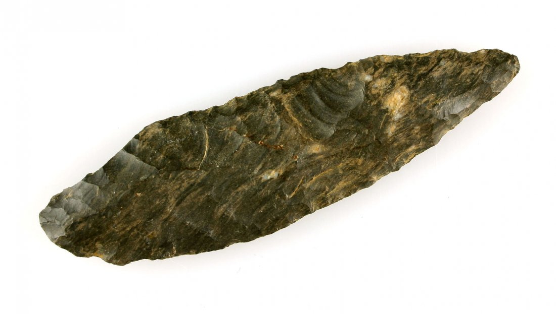 Oblique Flaked 3 1/2" Elk River: Well patinated Dover Chert from Tennessee. Very thin with exceptional flaking. Ex- J. Hale and D. Bratcher Collections.