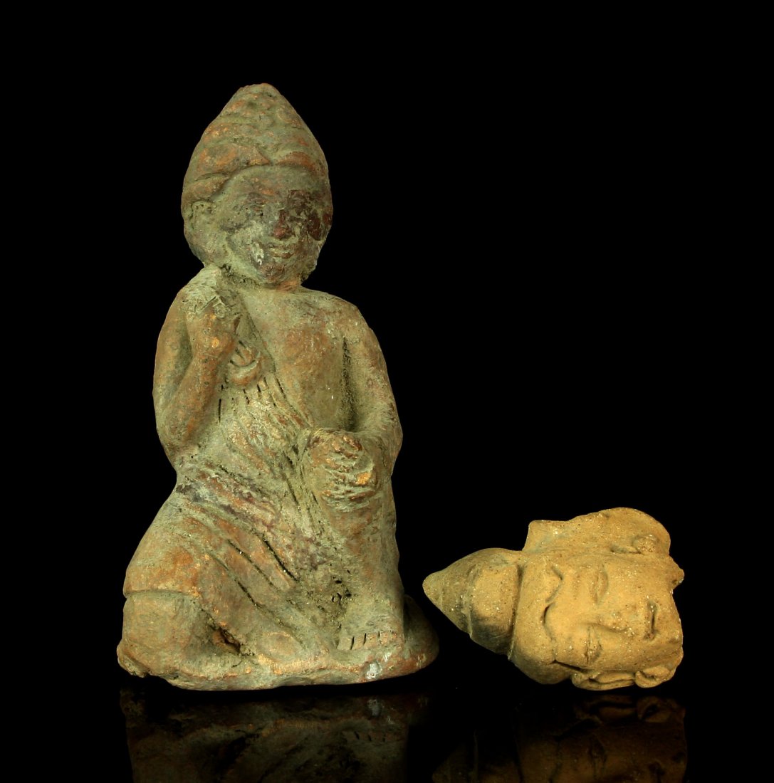 Pair of Buddhist Pottery Figurals: One complete statues and other just a head. Decorative?