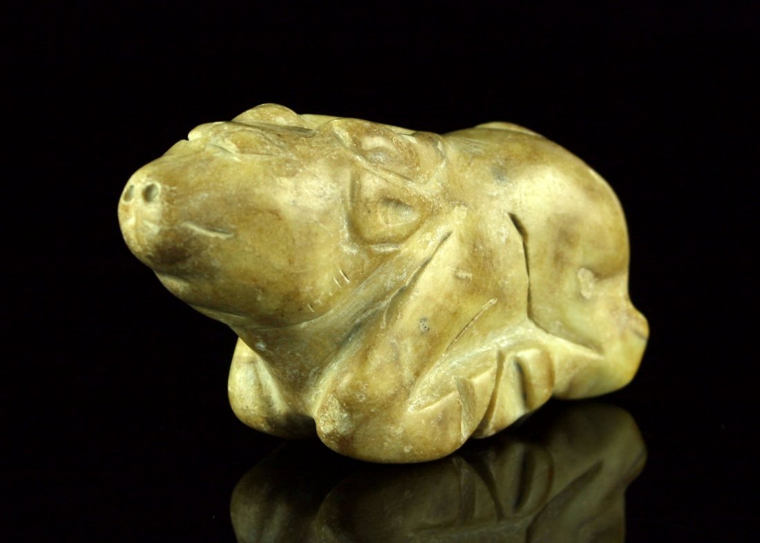 3 3/8" Chinese Reclining Bull: Nice example of unknown age depicting a bull or cow laying down. Cream/Yellow stone.
