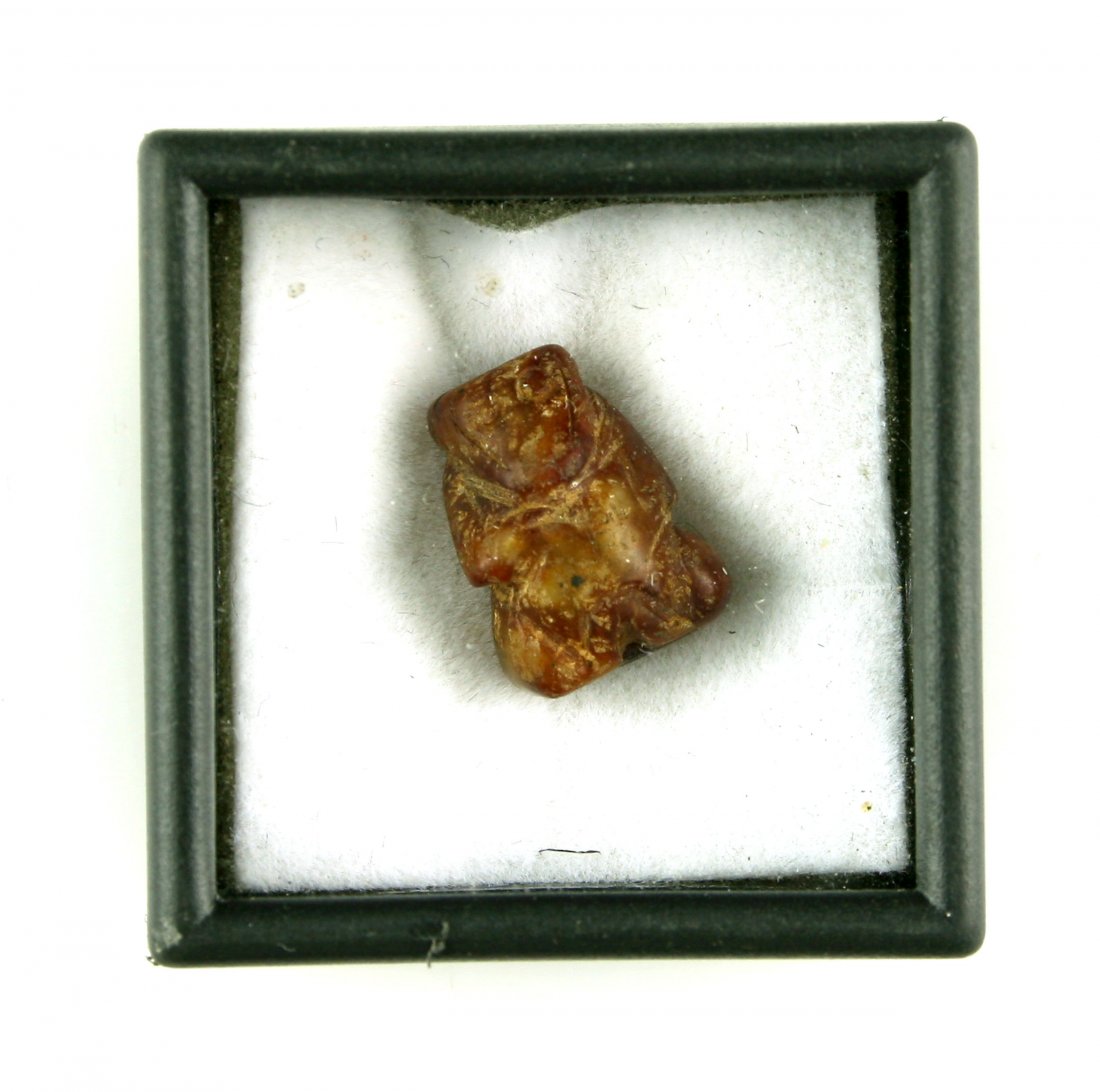 9/16" Ancient Chinese Effigy Agate Bead: Excavated example in carnelian agate carved in an animal shape.