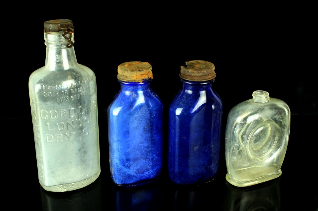 4 Vintage Bottles: 4 Bottles of various manufacture including two Phillips Milk of Magnesia and an interesting wire-top Gordon's Gin.