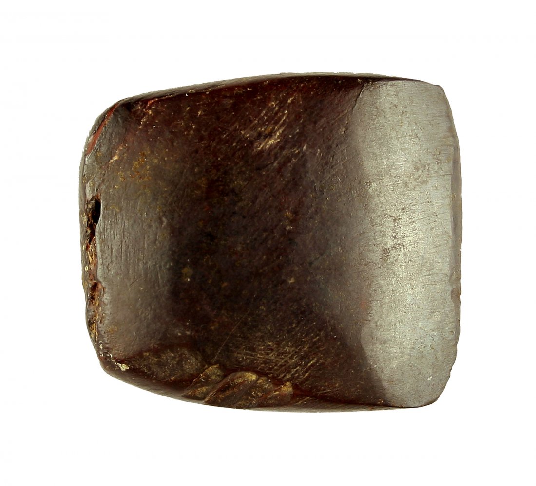 1 3/8" Hematite Celt: Nice miniature celt that would have been hafted in an antler or bone foreshaft. Montgomery Co., Kentucky. Ex - Humphries and Nick Hadden Collection.