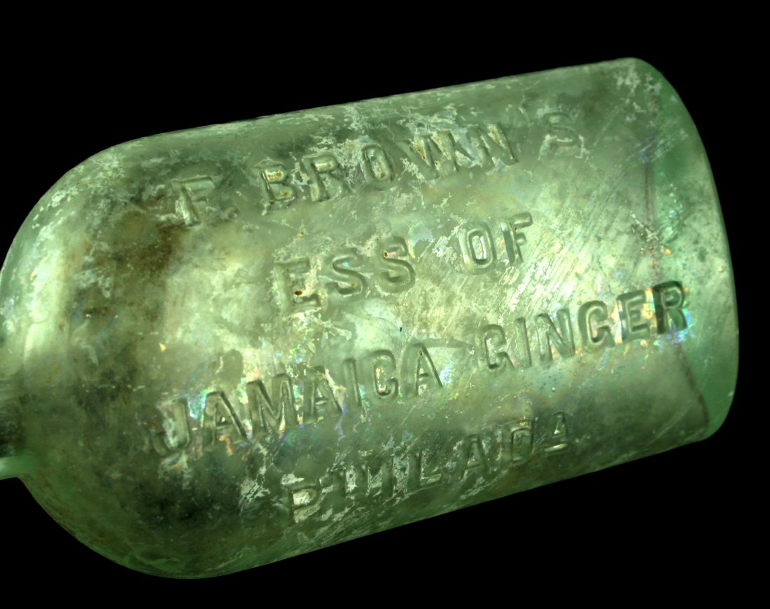 1850's-1860's F. Brown's Ess Of Jamaica Ginger Bottle: Nice Greenish glass example with iridescence made in the 1850's-1860's and even earlier.