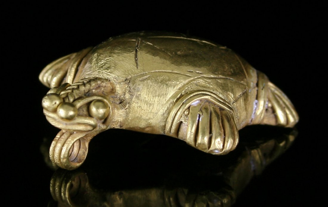 1 5/8" Tairona Turtle Effigy Pendant: Nice example in the form of a turtle of unknown gold content. Weight: 12.5 Grams. Colombia.