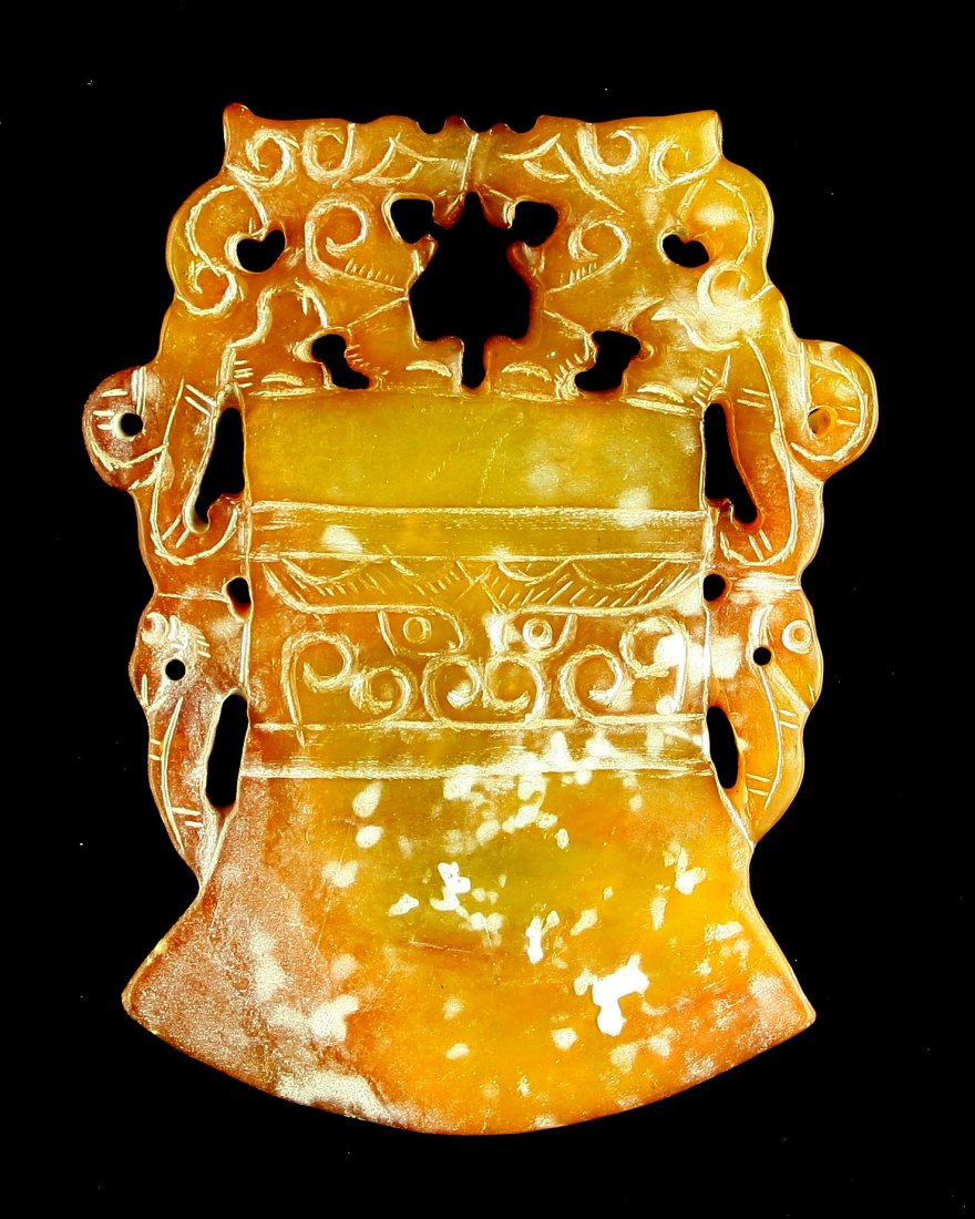 3 5/16" Chinese Carved Axe Pendant: Nice example in yellow hardstone/jade of unknown age. Features 5 faces.