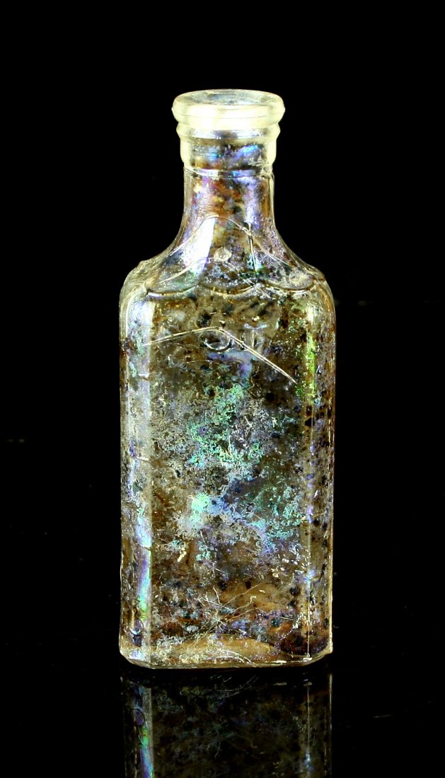 4 1/2" Iridescent 3ii Medicine Bottle: Nice colorful bottle with residue inside. Only markings '3ii' and graduations one two corners. Scotland.