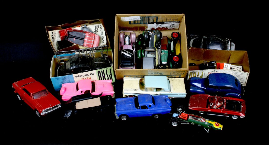 Assortment of Model Cars: Various stages of completion, this lot includes around a dozen (+/-) plastic model cars/trucks. Good source of parts or perhaps an alternative use.