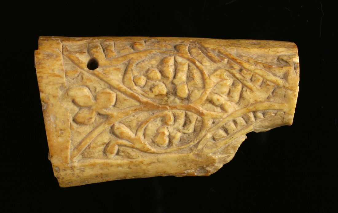 3 1/4" Medieval Carved Bone Sword Handle: Pretty example in polished bone with vine design to enhance the grip. Circa 12th Century AD. From a Los Angeles Estate Collection.