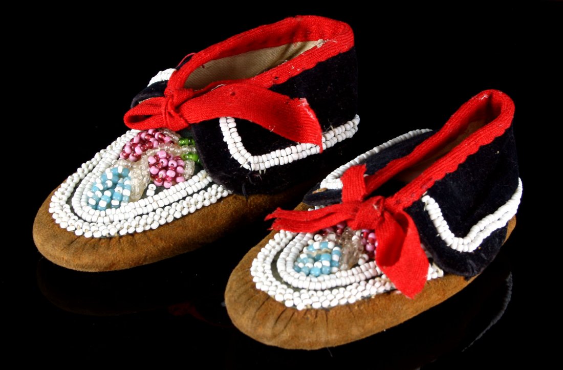 5" Iroquois Beaded Child's Moccasins: Nicely made pair with colorful beading. Formerly of the Dr. Evan Maurer Collection. Likely made between 1920-1950