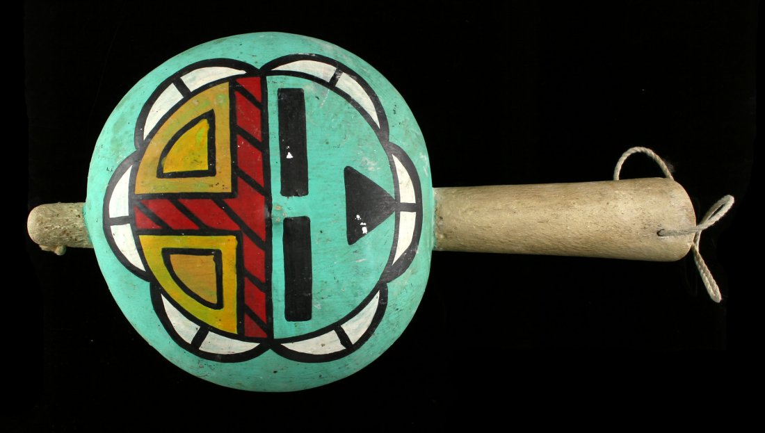 10 1/2" Hopi Gourd Rattle - Contemporary: From the collection of Dr. Evan Maurer. Painted blue with black widow and Hopi Sun God Tawa. Contemporary probably made between 1950-1990.