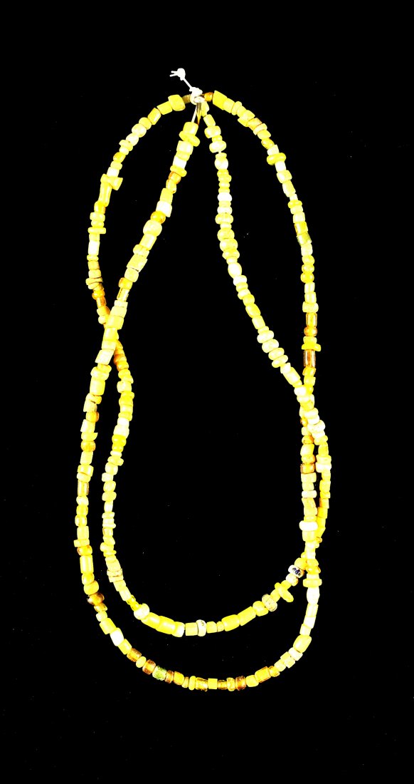 25" Yellow Seed Bead Necklace: Excellent example with variety of size beads. Circa 1890-1910. From the Dr. Evan Maurer Collection.