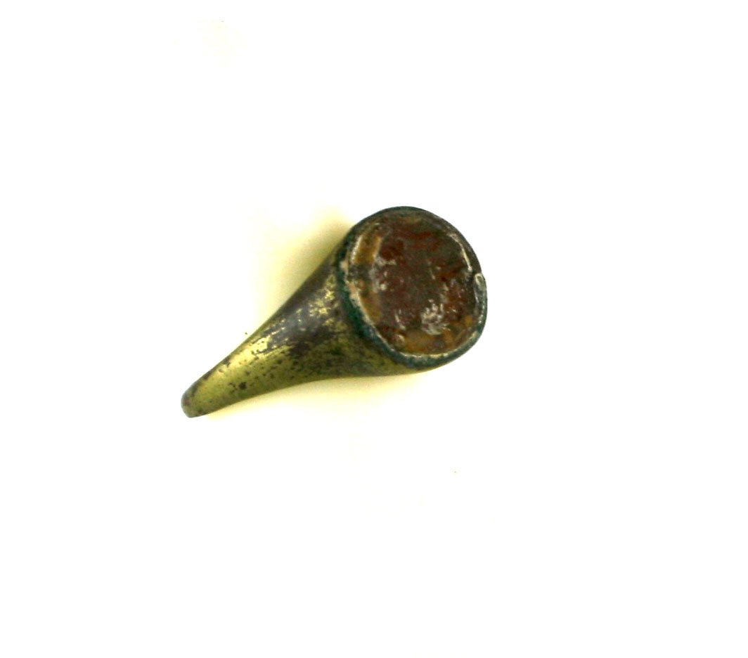 Roman Bronze Ring with Intaglio Setting: Nice example partially cleaned with inset intaglio stone measuring 12mmx9mm with carved pair of human figures in agate. Ring size a modern #4.