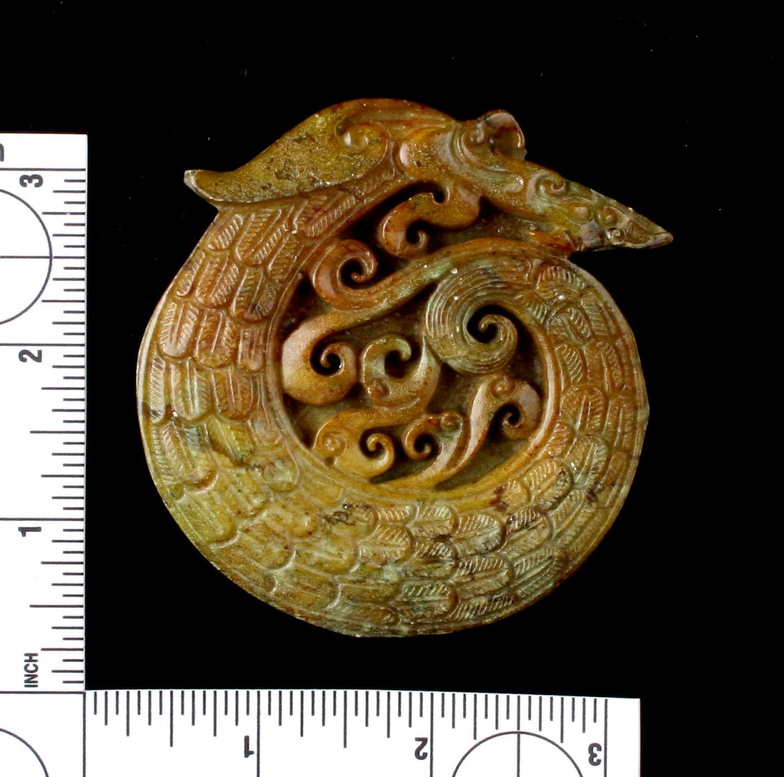 3 1/16" Chinese Carved Dragon Plaque: Detailed carved example with features and a dragon form. Unknown age.