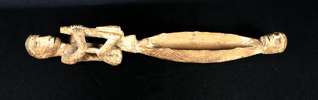 26 1/2" Sago Grub Bowl: Papua New Guinea exceptional example featuring human effigies and detailed engraving. Estimated 1890-1940's. South Pacific