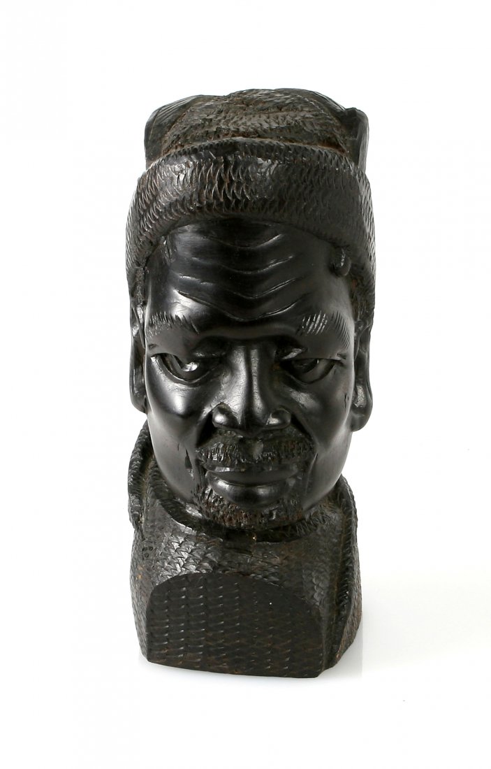 7 1/2" Ebony Carving of Tribal Leader: African carving of a tribal leader or elder. Appears to be ebony wood.