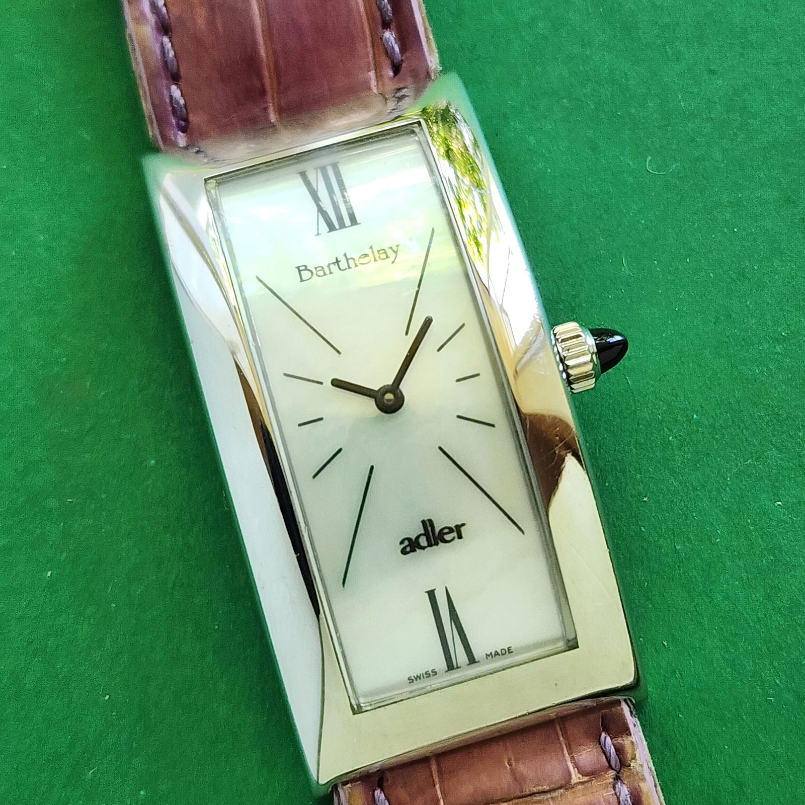 Barthelay Mother Of Pearl Dial Tank Watch: Ticking. Please note one case back screw has broken off as per photos