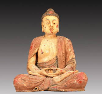 A Precious Wood Painted Glass-Inlaid Figure Of Buddha Shakyamuni: A Precious Wood Painted Glass-Inlaid Figure Of Buddha Shakyamuni. Superbly and sensitively sculpted in the form of a seated Buddha Shakyamuni,with well-defined arched eyebrows juxtaposed with the prom