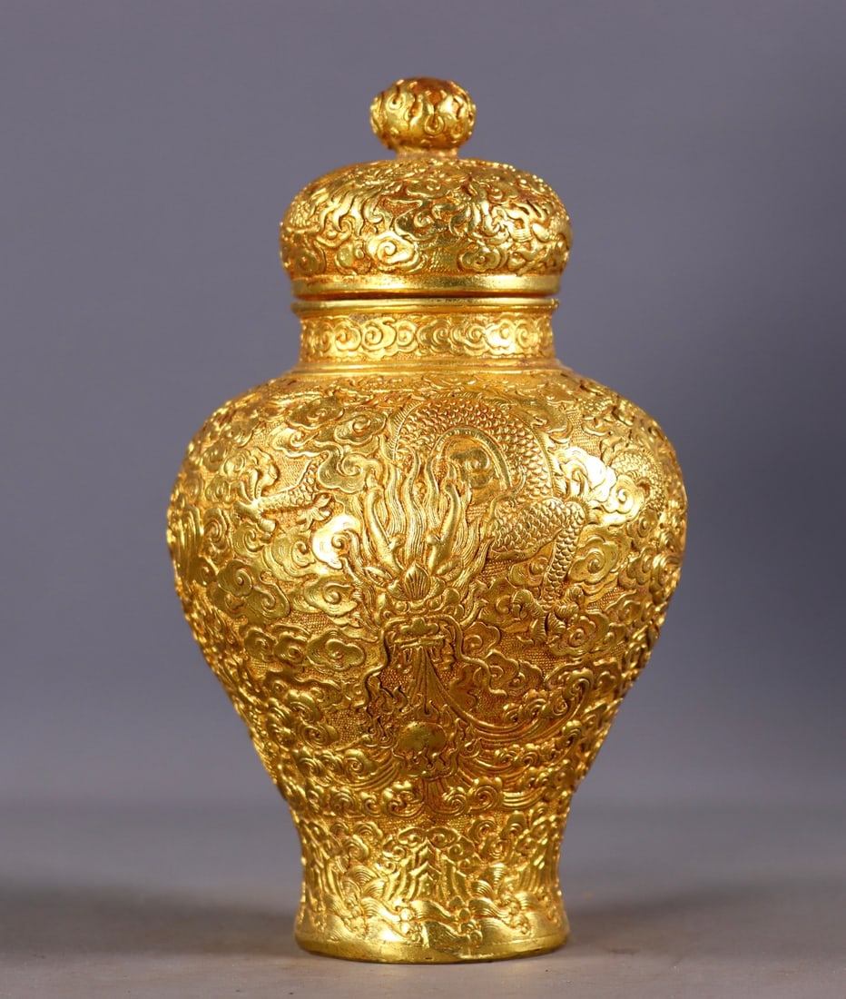 A Rare Gilt Bronze Auspicious Cloud and Dragon Pattern Cover Jar: A Rare Gilt Bronze Auspicious Cloud and Dragon Pattern Cover Jar,Qing Dynasty, China,Qianlong Four-character Mark,Size:17cmx9cm,Weight:576g 铜鎏金祥云龙纹