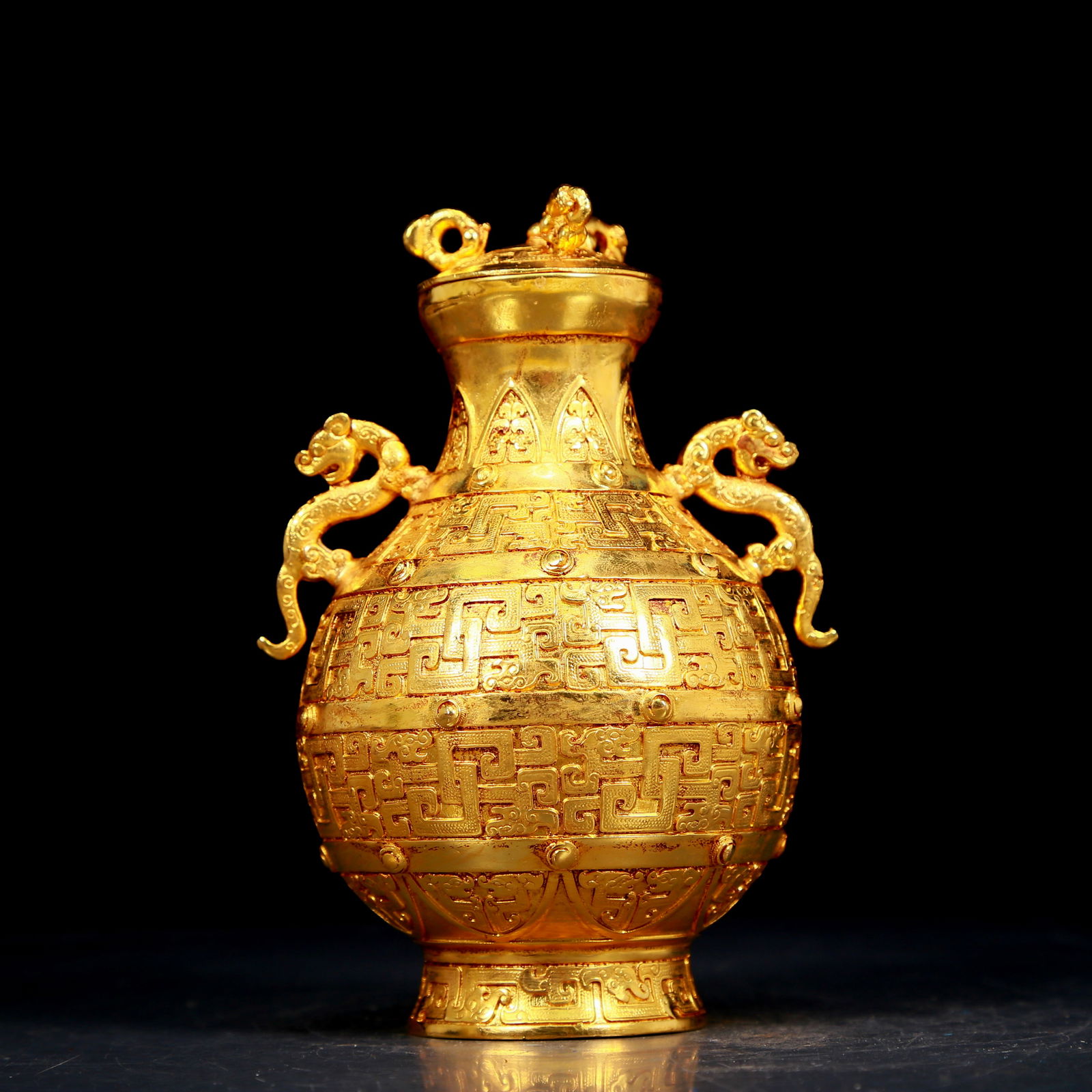 An exquisite gilt bronze vase with double ears and auspicious animal patterns (1 of 10)