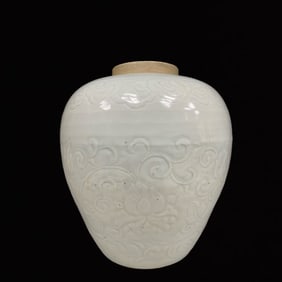 An Exquisite Celadon Glazed Lotus Pattern Jar