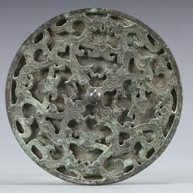 An Archaic Bronze Mirror