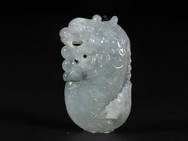 A Fine Jadeite Dragon Pattern Pendant