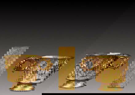 A Set of Exquisite Gilt Bronze Figure Pattern Dragon-Ears Cup, With Scriptures Dragon Pattern Seal: A Set of Exquisite Gilt Bronze Figure Pattern Dragon-Ears Cup, With Scriptures Dragon Pattern Seal,Qing Dynasty, China,Size:(Cup)6.5cmx9.5cmx7cm,(Seal)8cmx3cmx3cm,TotalWeight:1201g &#38108;&#37775;&#3