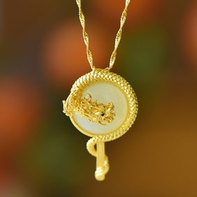 An Exquisite Sterling Silver-Gold Plated Inlaid White Jade Pendant